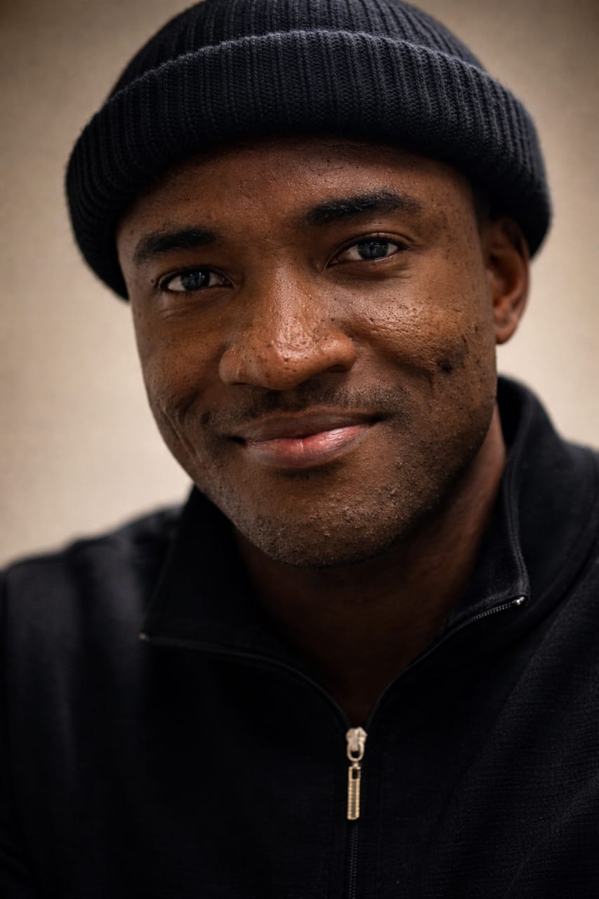 profile picture in black shirt and beanie